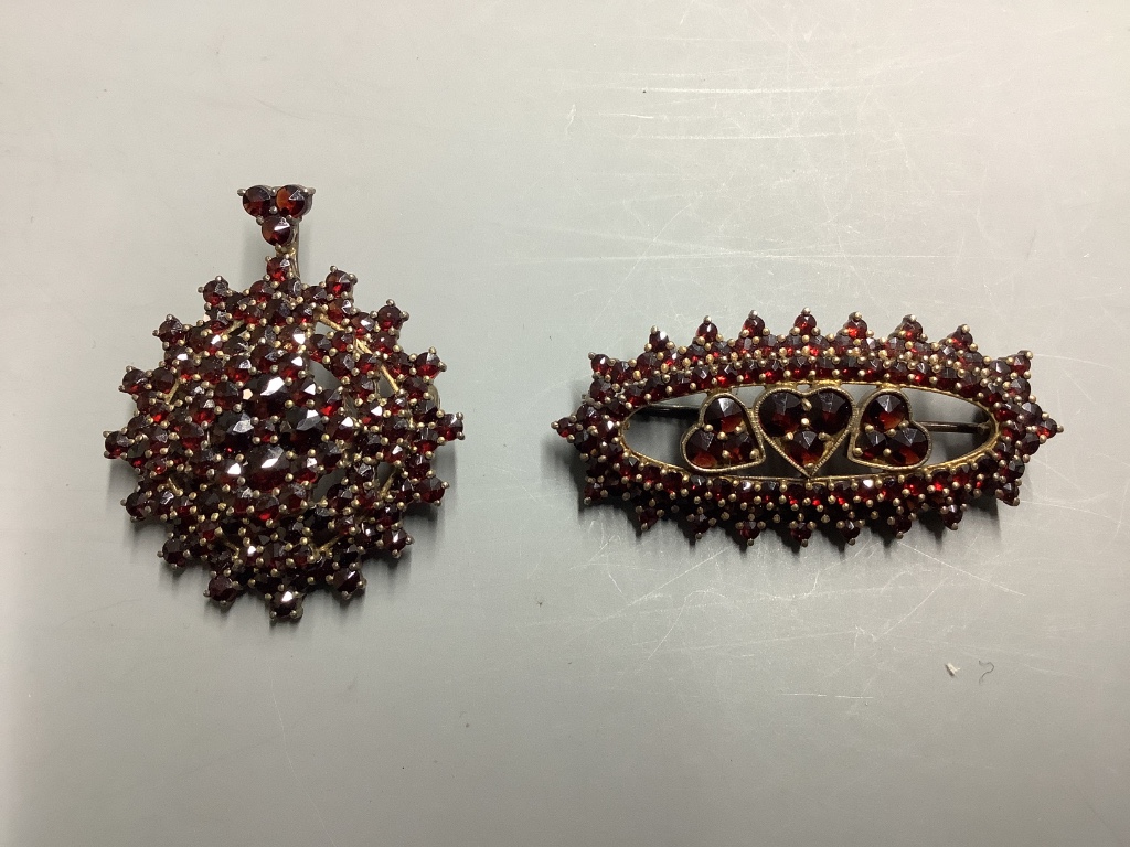 A group of facetted garnet set jewellery, including brooches, pendants and ear studs